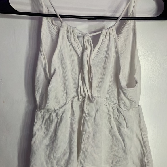 White cute summer shirt has 2 holes and one little non noticeable stain - Picture 6 of 6